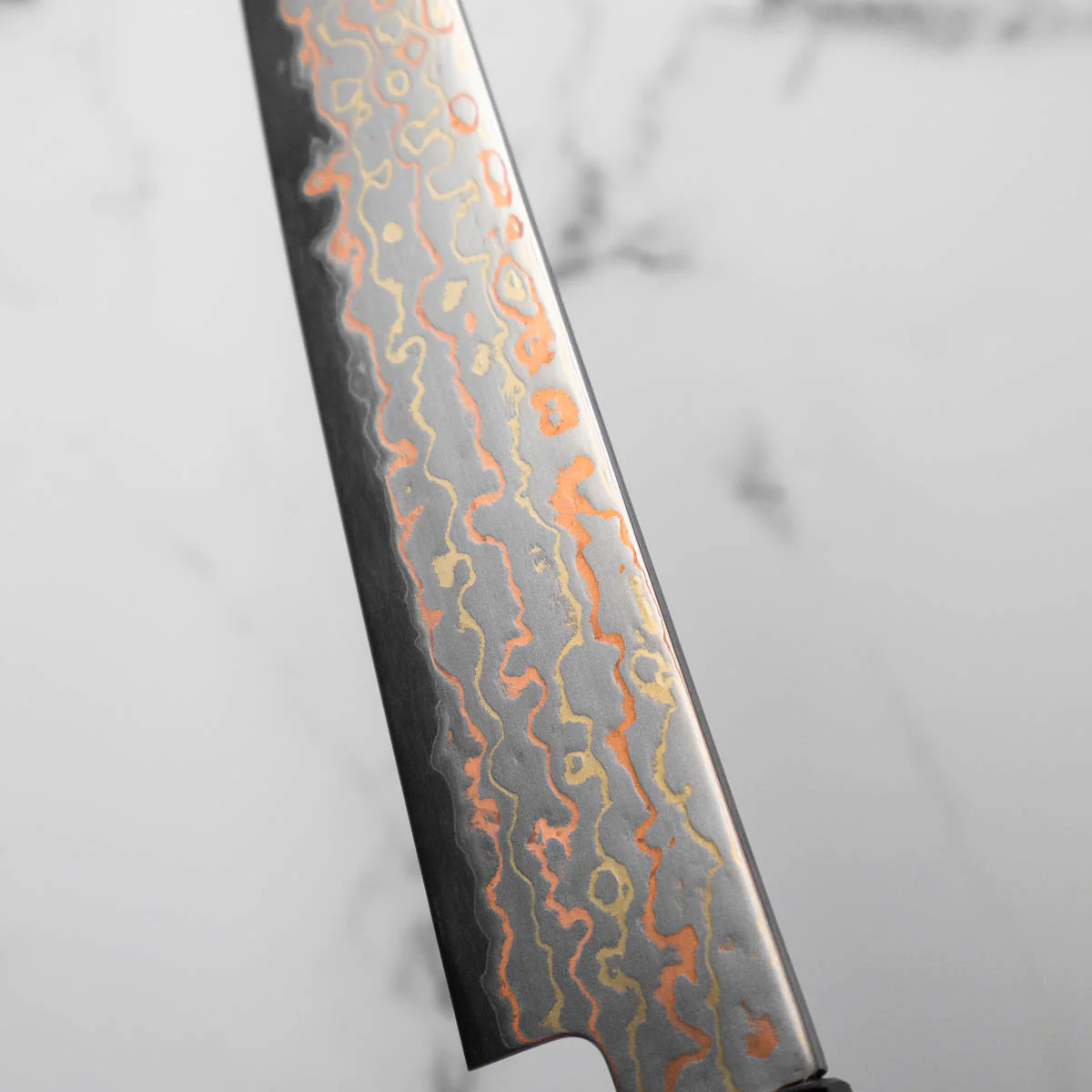 Hatsukokoro Hayabusa Blue 2 Rainbow Damascus Petty 150mm - Ebony - Image 6