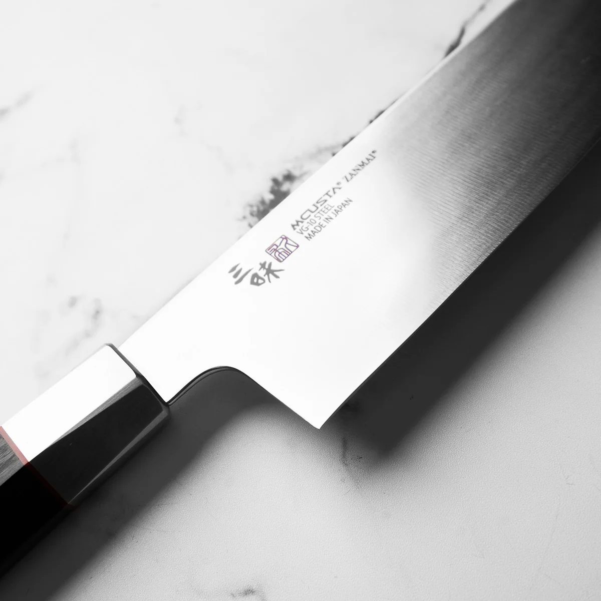 Mcusta Zanmai "Hybrid" VG10 Santoku 180mm - Image 5