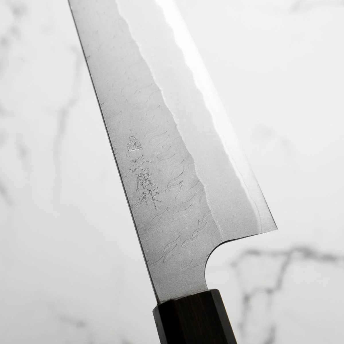 Nigara Hamono Blue Super Migaki Tsuchime Santoku 180mm - Ebony - Image 5