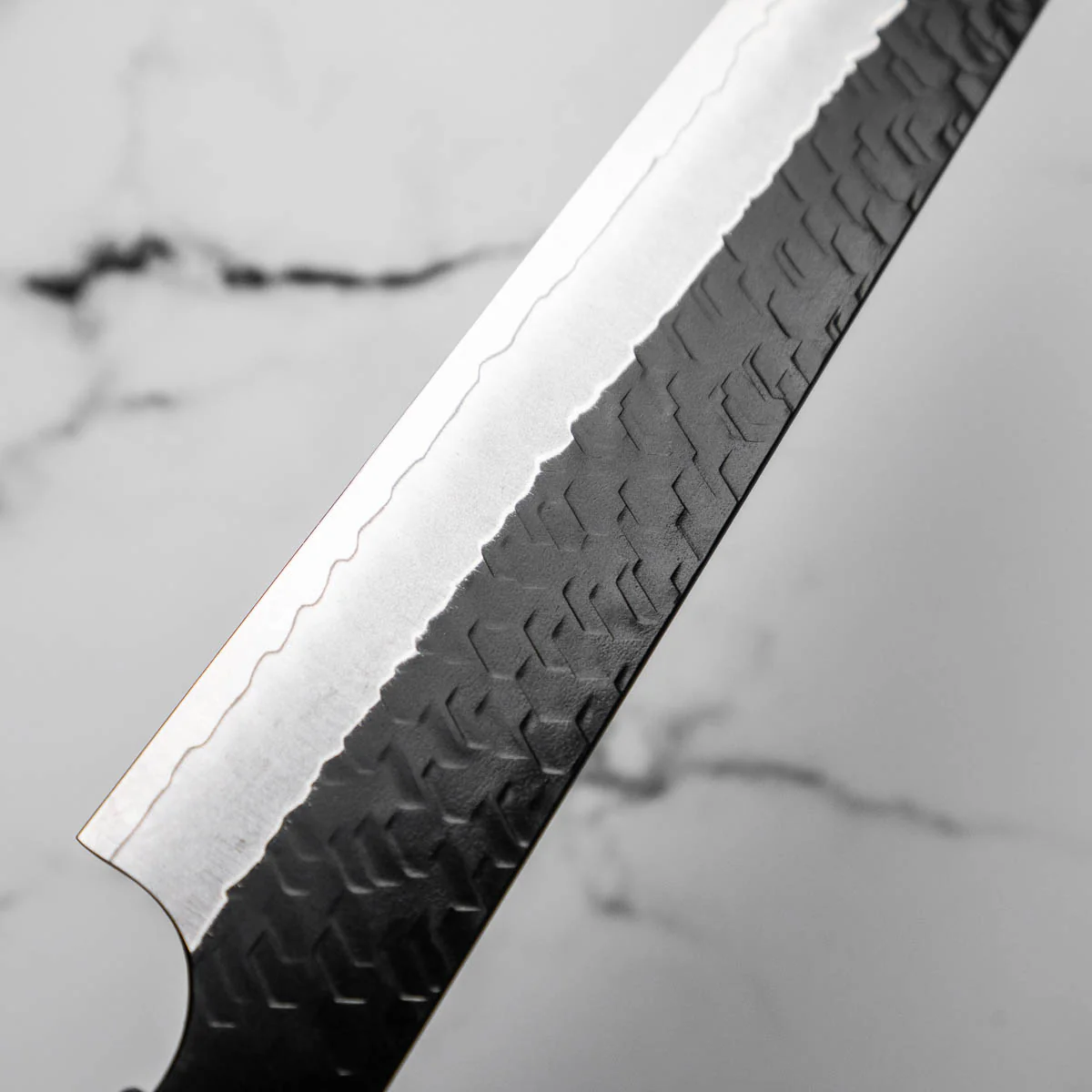 Nigara Hamono SG2 Kurouchi Tsuchime Sujihiki 240mm - Ebony - Image 6