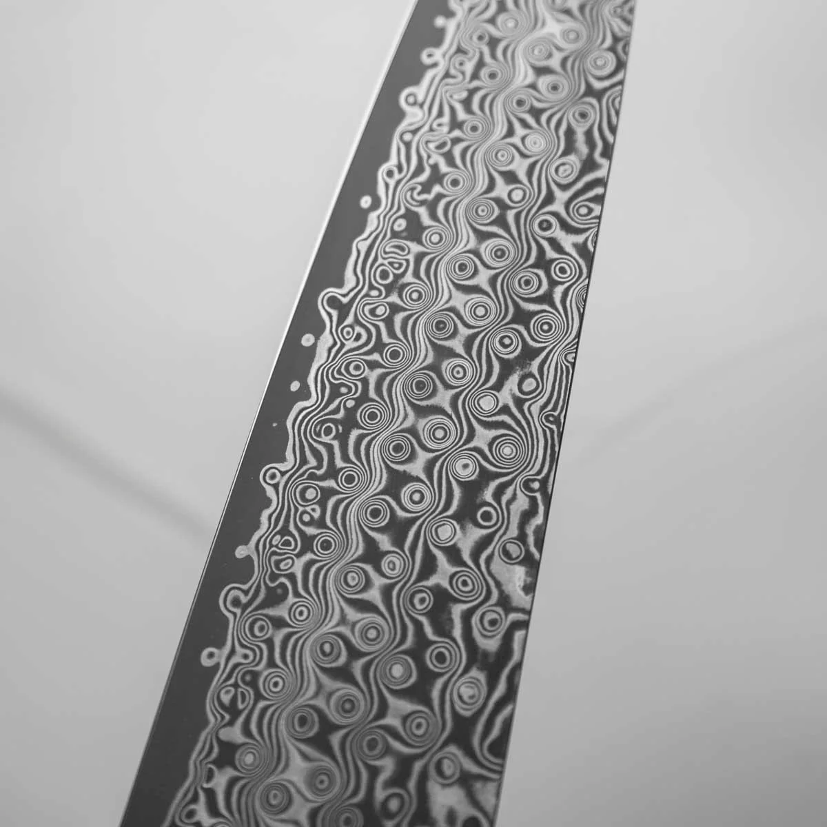 Nigara Hamono SG2 Raindrop Damascus Gyuto 240mm - Ebony - Image 4