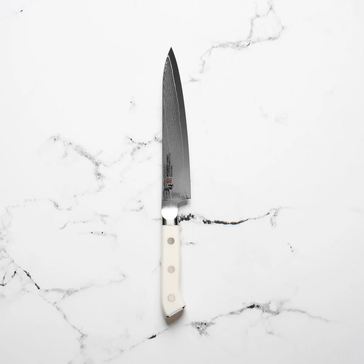 Mcusta Zanmai Corian Classic VG10 Damascus Petty 150mm - Image 3