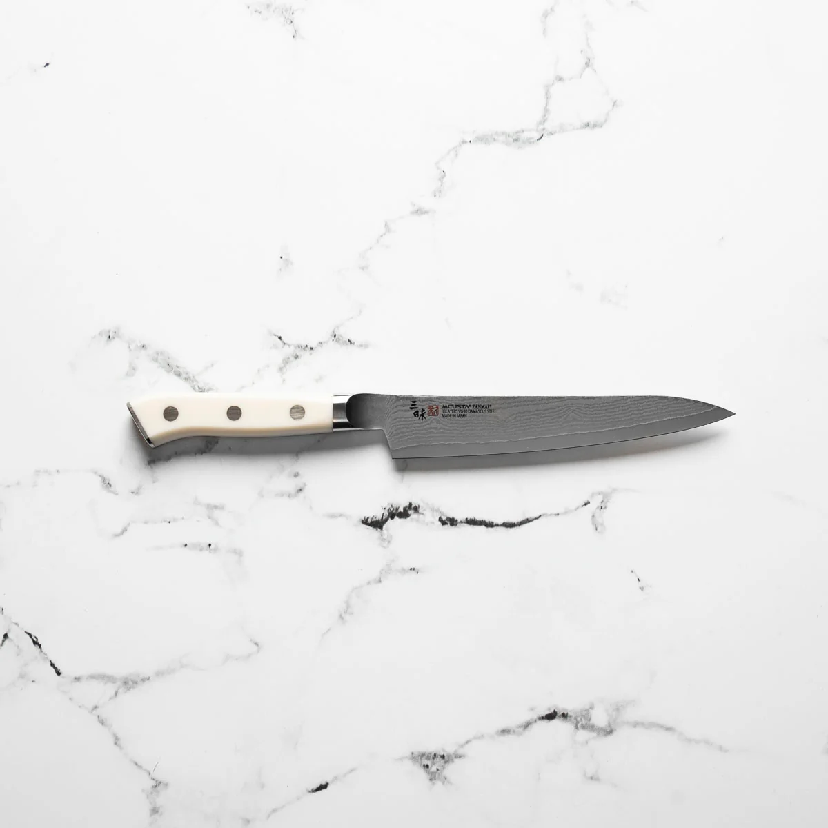 Mcusta Zanmai Corian Classic VG10 Damascus Petty 150mm - Image 4
