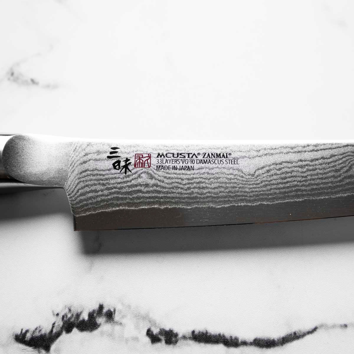 Mcusta Zanmai Corian Classic VG10 Damascus Petty 150mm - Image 5