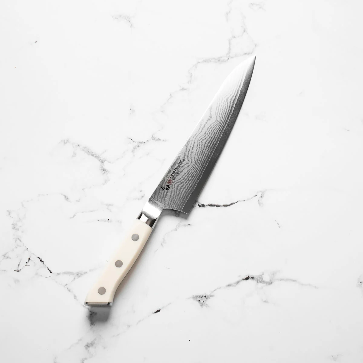Mcusta Zanmai Corian Classic VG10 Damascus Gyuto 210mm - Image 2