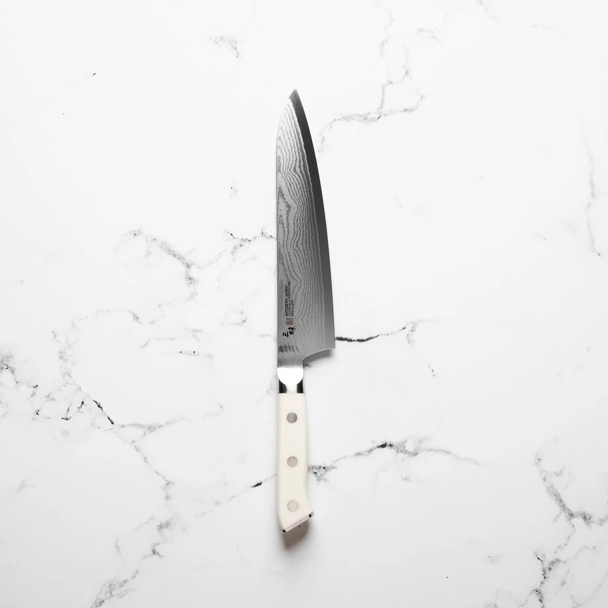 Mcusta Zanmai Corian Classic VG10 Damascus Gyuto 210mm - Image 3
